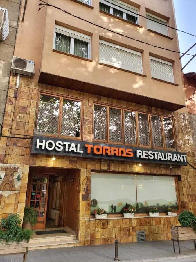 Hospedium Hostal Torras Sant Hilari Sacalm Exterior foto